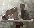 A MAN AND A WOMAN, Cement (preperation for painted bronze), 17cm (7in)