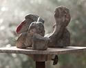 A MAN AND A WOMAN, Cement (preperation for painted bronze), 17cm (7in)